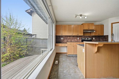 169 Cranberry Square Se, Calgary, AB - Indoor Photo Showing Kitchen