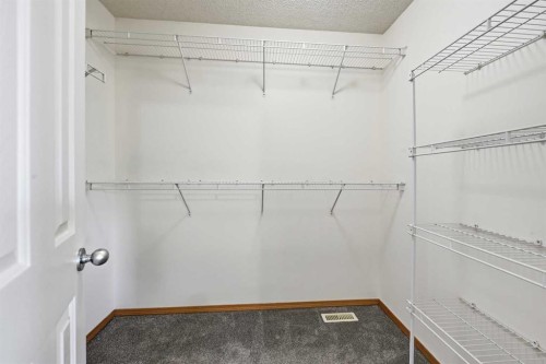 169 Cranberry Square Se, Calgary, AB - Indoor With Storage