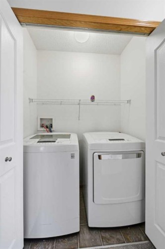 169 Cranberry Square Se, Calgary, AB - Indoor Photo Showing Laundry Room