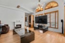 254 Erin Woods Circle Se, Calgary, AB  - Indoor Photo Showing Living Room With Fireplace 