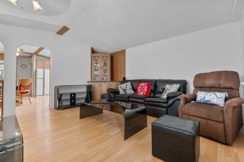 254 Erin Woods Circle Se, Calgary, AB - Indoor Photo Showing Living Room
