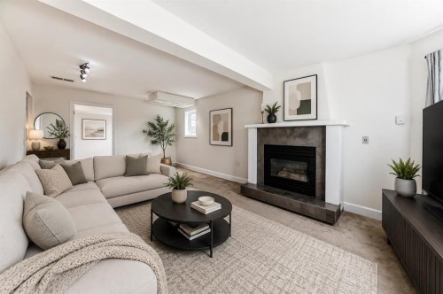 26 Green Meadow Drive, Strathmore, AB - Indoor Photo Showing Living Room With Fireplace