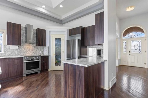 72 Strathlea Place Sw, Calgary, AB - Indoor Photo Showing Kitchen With Upgraded Kitchen