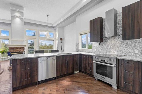 72 Strathlea Place Sw, Calgary, AB - Indoor Photo Showing Kitchen With Upgraded Kitchen