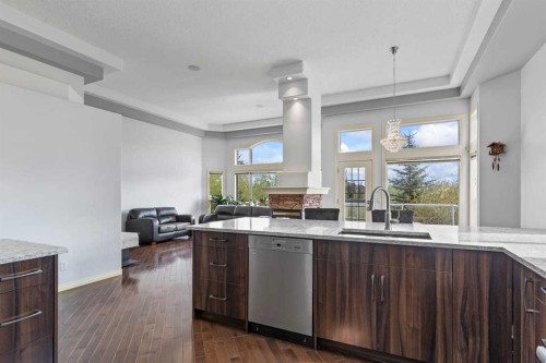 72 Strathlea Place Sw, Calgary, AB - Indoor Photo Showing Kitchen With Upgraded Kitchen