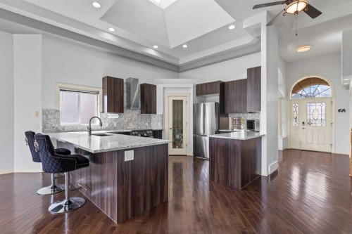 72 Strathlea Place Sw, Calgary, AB - Indoor Photo Showing Kitchen With Upgraded Kitchen