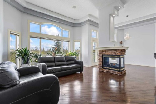 72 Strathlea Place Sw, Calgary, AB - Indoor Photo Showing Living Room With Fireplace