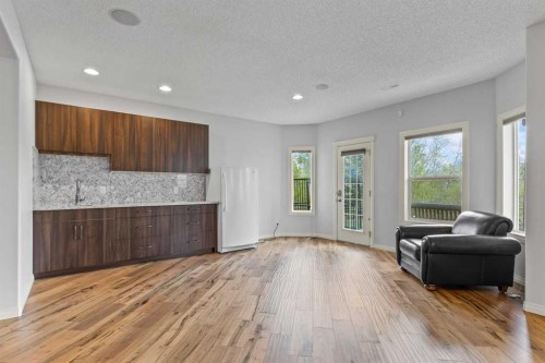 72 Strathlea Place Sw, Calgary, AB - Indoor Photo Showing Living Room