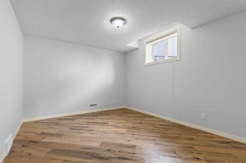 72 Strathlea Place Sw, Calgary, AB - Indoor Photo Showing Other Room