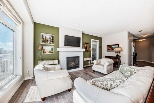 39 Sage Bluff Mews Nw, Calgary, AB - Indoor Photo Showing Living Room With Fireplace