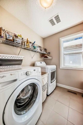39 Sage Bluff Mews Nw, Calgary, AB - Indoor Photo Showing Laundry Room