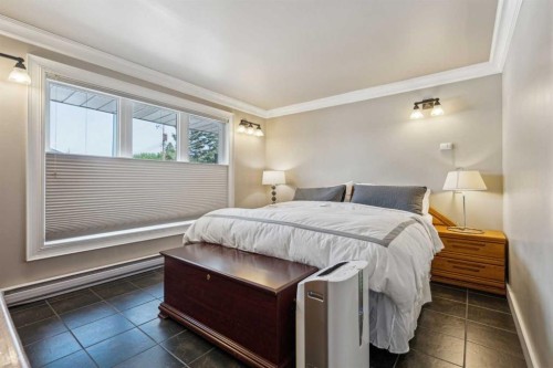 25 Manor Road Sw, Calgary, AB - Indoor Photo Showing Bedroom