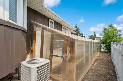 25 Manor Road Sw, Calgary, AB - Outdoor With Exterior