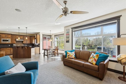 957 Coopers Drive Sw, Airdrie, AB - Indoor Photo Showing Living Room