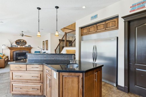 957 Coopers Drive Sw, Airdrie, AB - Indoor Photo Showing Kitchen With Upgraded Kitchen