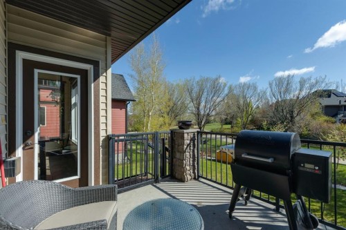 957 Coopers Drive Sw, Airdrie, AB - Outdoor With Deck Patio Veranda With Exterior