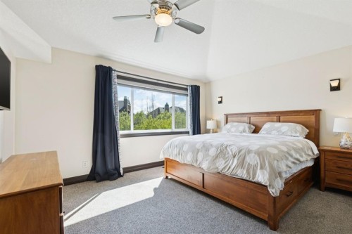 957 Coopers Drive Sw, Airdrie, AB - Indoor Photo Showing Bedroom