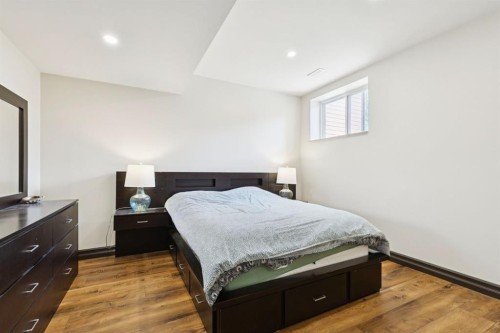 957 Coopers Drive Sw, Airdrie, AB - Indoor Photo Showing Bedroom