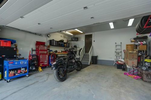 957 Coopers Drive Sw, Airdrie, AB - Indoor Photo Showing Garage