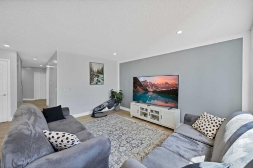 218 Saddlefield Place Ne, Calgary, AB - Indoor Photo Showing Living Room