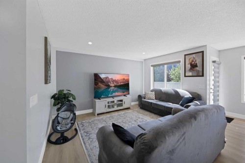 218 Saddlefield Place Ne, Calgary, AB - Indoor Photo Showing Living Room