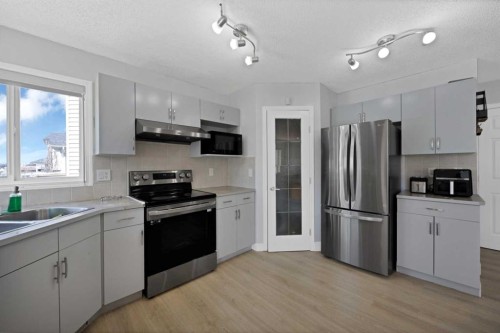 218 Saddlefield Place Ne, Calgary, AB - Indoor Photo Showing Kitchen