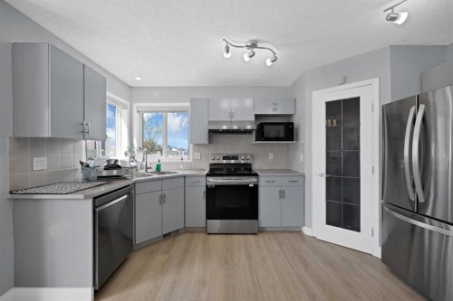 218 Saddlefield Place Ne, Calgary, AB - Indoor Photo Showing Kitchen
