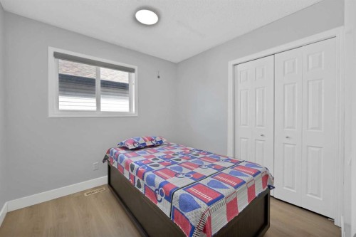 218 Saddlefield Place Ne, Calgary, AB - Indoor Photo Showing Bedroom