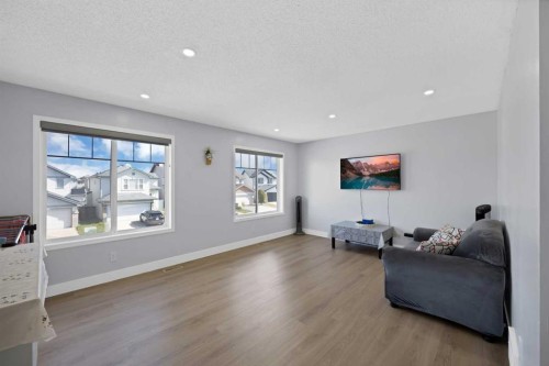 218 Saddlefield Place Ne, Calgary, AB - Indoor Photo Showing Living Room