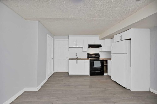 218 Saddlefield Place Ne, Calgary, AB - Indoor Photo Showing Kitchen