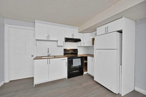 218 Saddlefield Place Ne, Calgary, AB - Indoor Photo Showing Kitchen