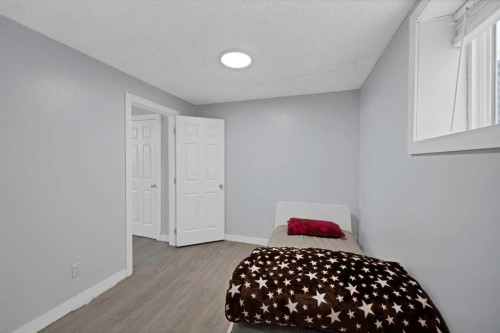 218 Saddlefield Place Ne, Calgary, AB - Indoor Photo Showing Bedroom
