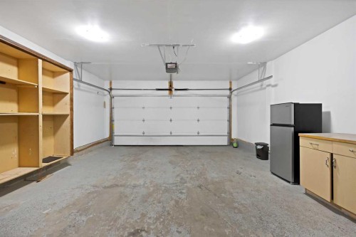 218 Saddlefield Place Ne, Calgary, AB - Indoor Photo Showing Garage