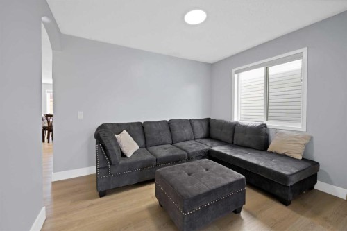 218 Saddlefield Place Ne, Calgary, AB - Indoor Photo Showing Living Room