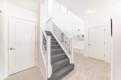 35 Sunset View, Cochrane, AB - Indoor Photo Showing Other Room
