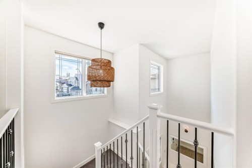 35 Sunset View, Cochrane, AB - Indoor Photo Showing Other Room