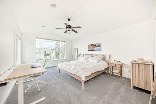 35 Sunset View, Cochrane, AB - Indoor Photo Showing Bedroom
