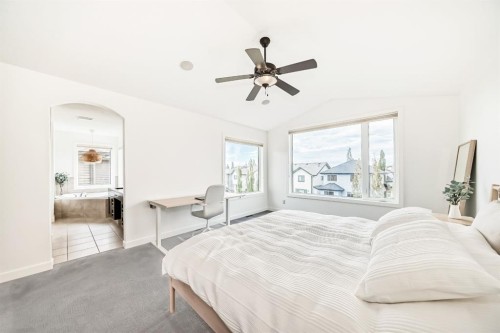 35 Sunset View, Cochrane, AB - Indoor Photo Showing Bedroom