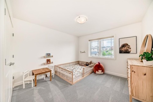 35 Sunset View, Cochrane, AB - Indoor Photo Showing Bedroom