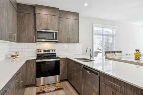 310 Sage Meadows Gardens Nw, Calgary, AB - Indoor Photo Showing Kitchen With Stainless Steel Kitchen With Double Sink With Upgraded Kitchen