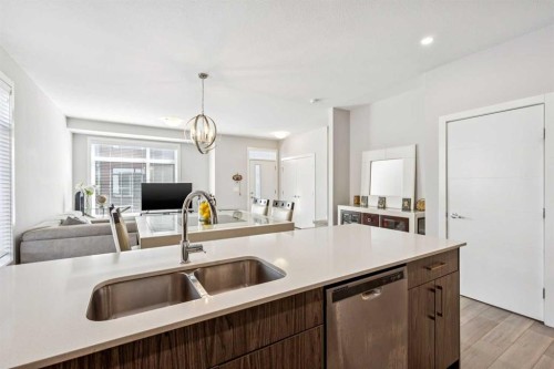 310 Sage Meadows Gardens Nw, Calgary, AB - Indoor Photo Showing Kitchen With Double Sink