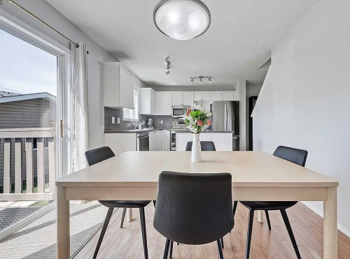 558 Evermeadow Road Sw, Calgary, AB - Indoor Photo Showing Dining Room