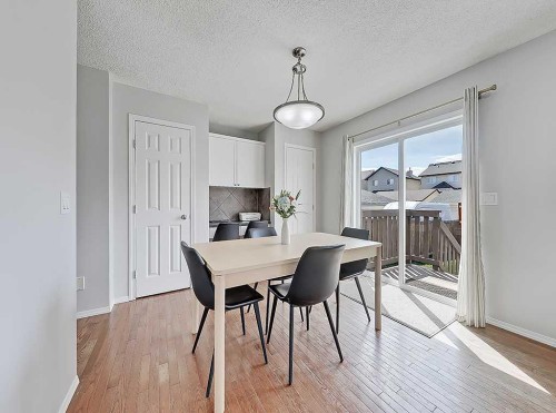 558 Evermeadow Road Sw, Calgary, AB - Indoor Photo Showing Dining Room
