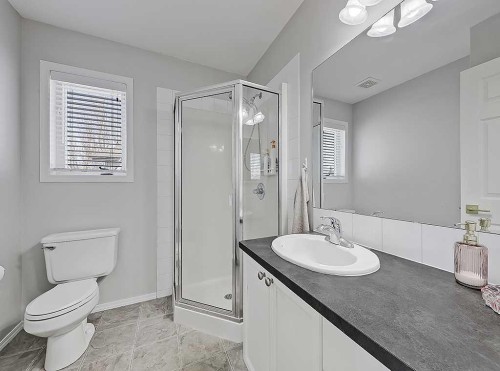 558 Evermeadow Road Sw, Calgary, AB - Indoor Photo Showing Bathroom