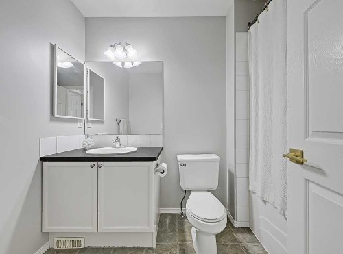 558 Evermeadow Road Sw, Calgary, AB - Indoor Photo Showing Bathroom
