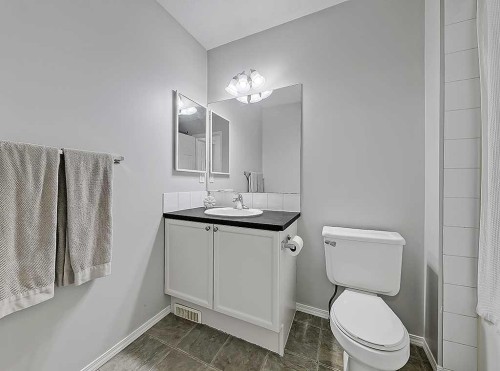 558 Evermeadow Road Sw, Calgary, AB - Indoor Photo Showing Bathroom