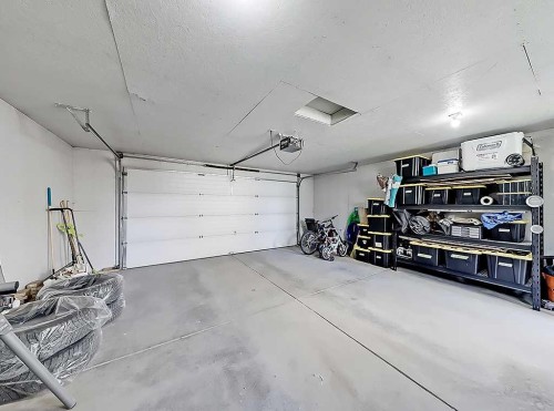 558 Evermeadow Road Sw, Calgary, AB - Indoor Photo Showing Garage