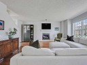 558 Evermeadow Road Sw, Calgary, AB  - Indoor Photo Showing Living Room With Fireplace 