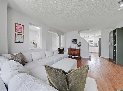558 Evermeadow Road Sw, Calgary, AB - Indoor Photo Showing Living Room