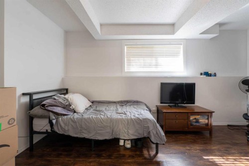 27 Erin Grove Court Se, Calgary, AB - Indoor Photo Showing Bedroom